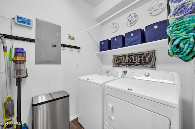 laundry room featuring separate washer and dryer and electric panel