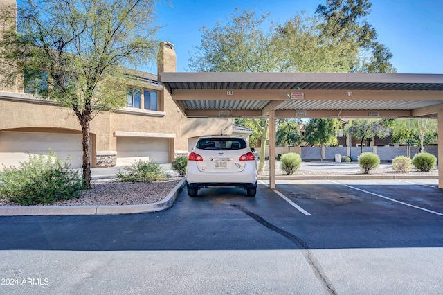 view of car parking with a carport