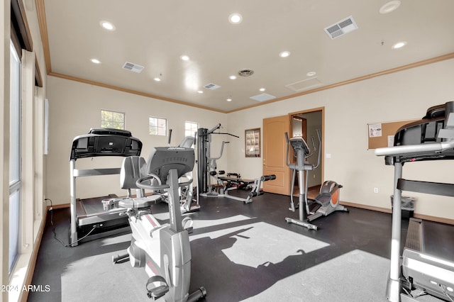 gym with ornamental molding