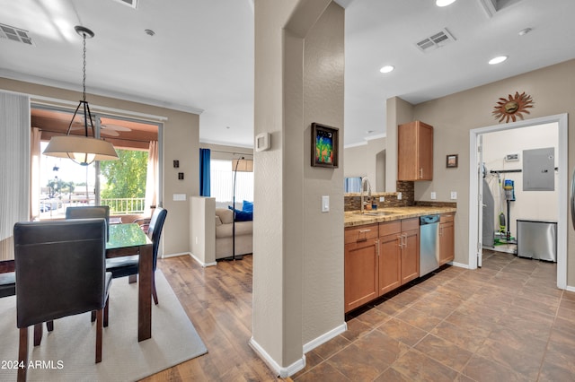 kitchen with dishwasher, sink, tasteful backsplash, hardwood / wood-style floors, and decorative light fixtures