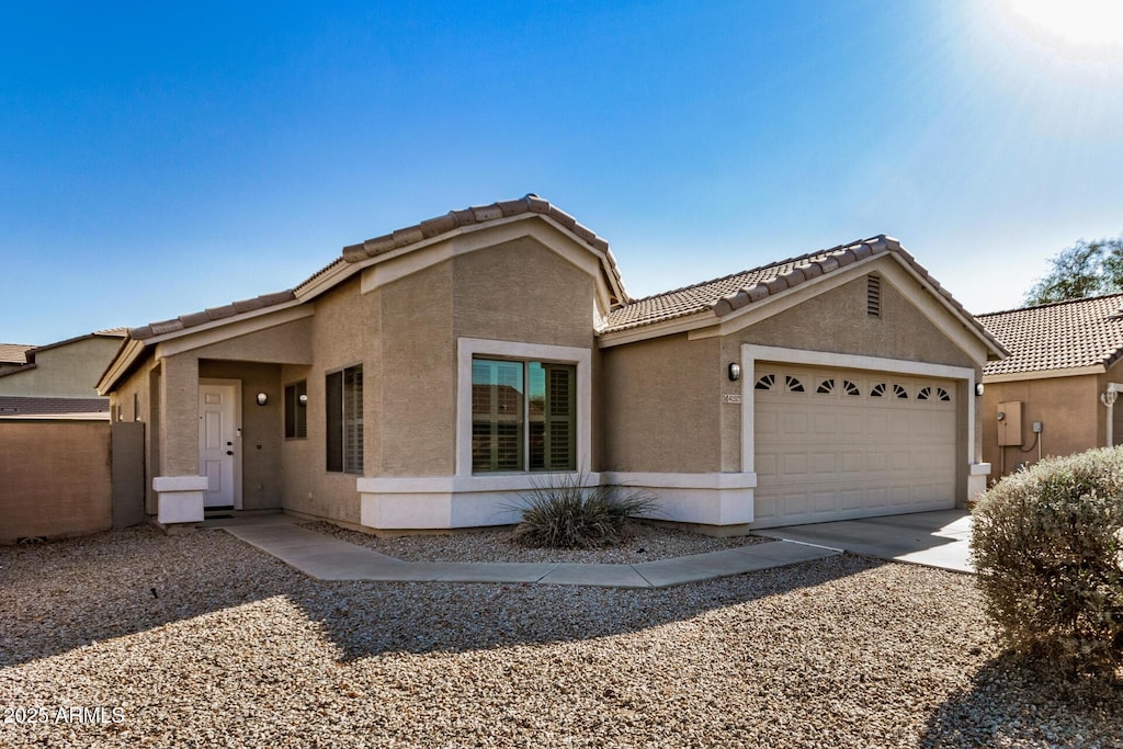 view of front of property with a garage