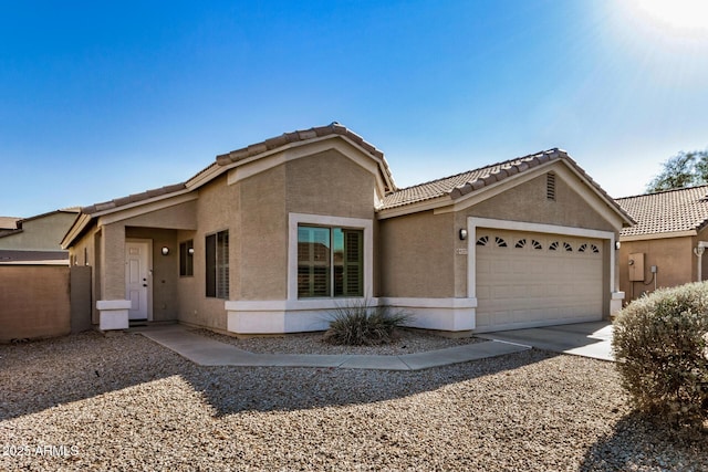 view of front of property with a garage