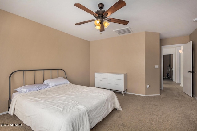 bedroom featuring ceiling fan and light colored carpet