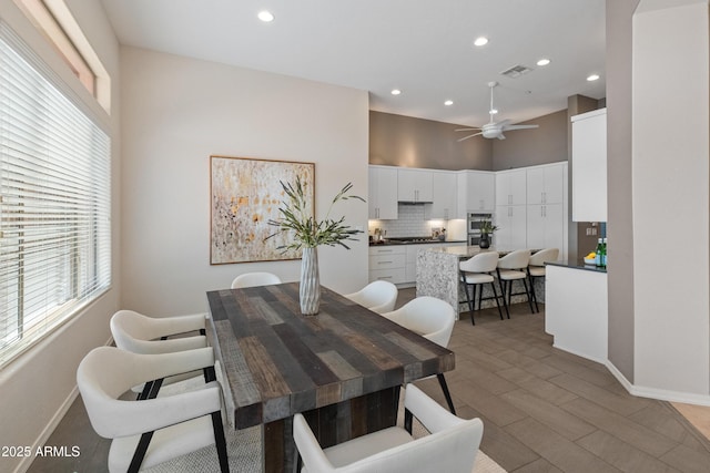 dining space featuring hardwood / wood-style floors and ceiling fan