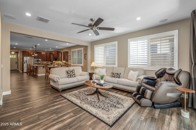 living area featuring recessed lighting, ceiling fan, dark wood-style flooring, and visible vents