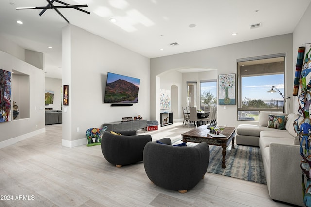 living room with light hardwood / wood-style floors