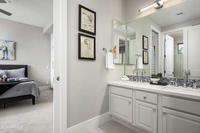 bathroom featuring backsplash and vanity