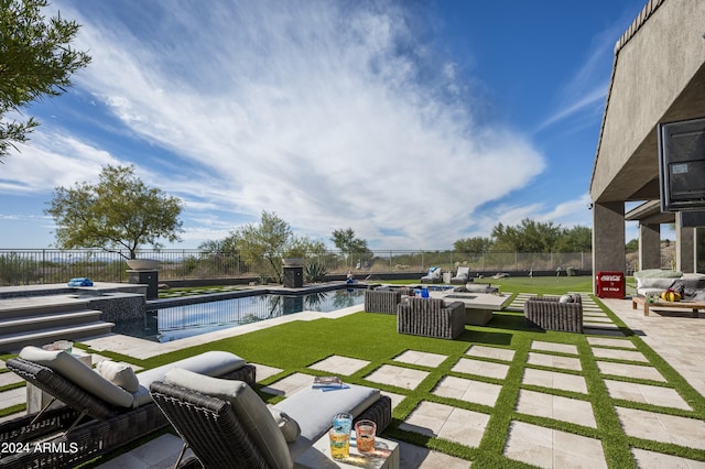 view of yard with a fenced in pool, an outdoor living space, and a patio