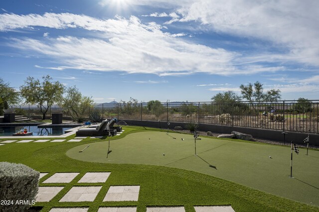 view of home's community featuring a swimming pool