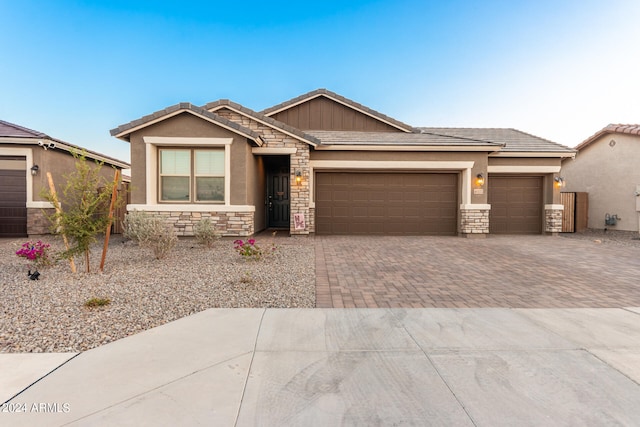 view of front of home with a garage