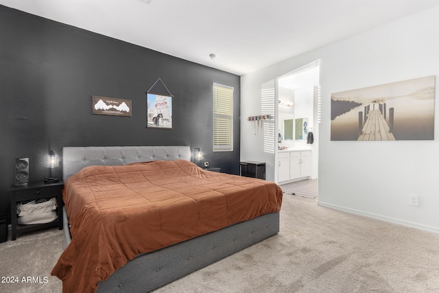 carpeted bedroom featuring connected bathroom