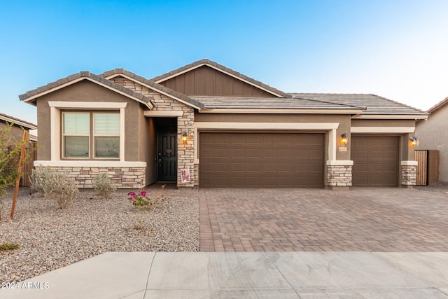 view of front of home with a garage