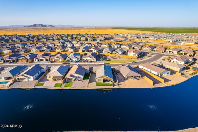 bird's eye view featuring a water and mountain view