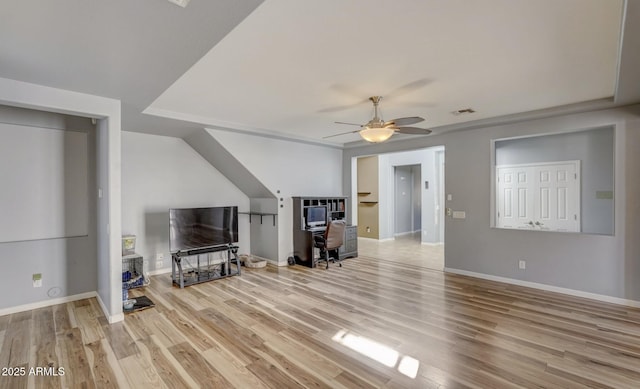 living room with ceiling fan and light hardwood / wood-style flooring