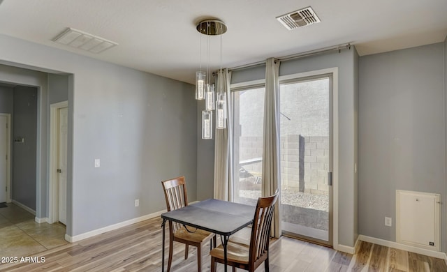 dining room featuring light hardwood / wood-style flooring