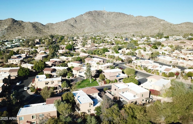 drone / aerial view featuring a mountain view