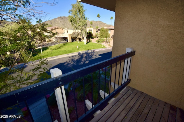 balcony featuring a mountain view