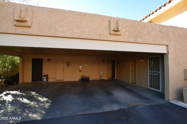 exterior space featuring a carport