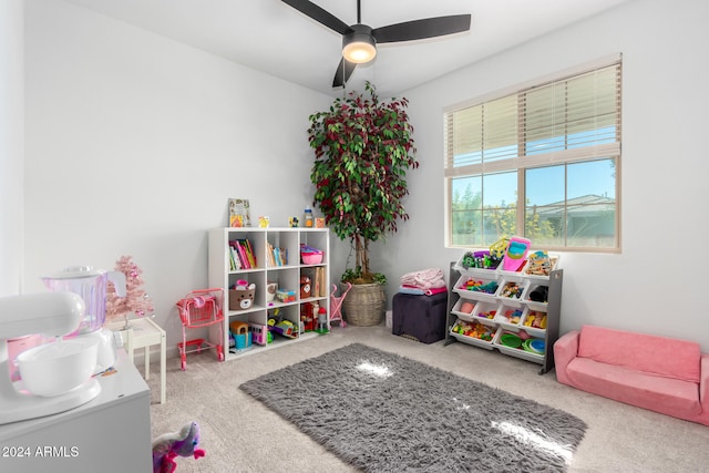 playroom with carpet flooring and ceiling fan