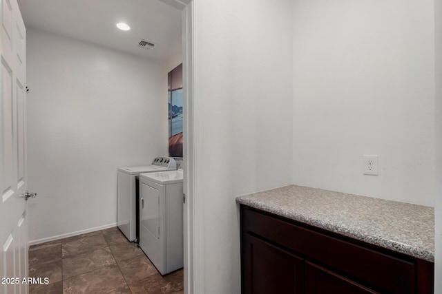 clothes washing area with recessed lighting, laundry area, separate washer and dryer, visible vents, and baseboards