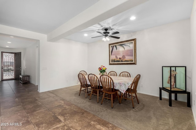 dining room featuring ceiling fan, dark carpet, beam ceiling, and recessed lighting