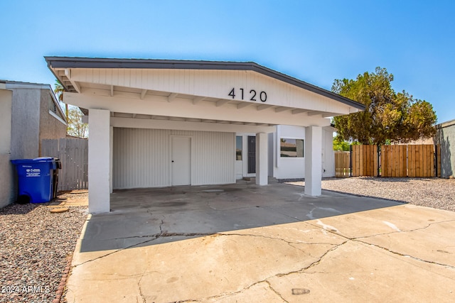 garage with a carport