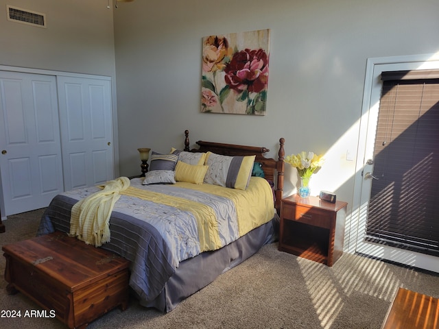 carpeted bedroom with a closet