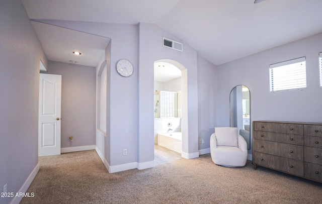 1950 W Park Pl, Chandler, AZ 85224 - carpeted bedroom featuring arched walkways, baseboards, lofted ceiling, and ensuite bath