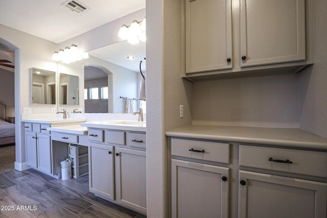 1950 W Park Pl, Chandler, AZ 85224 - ensuite bathroom with double vanity and wood finished floors