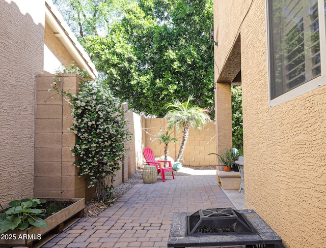 1950 W Park Pl, Chandler, AZ 85224 - view of patio featuring fence and a fire pit