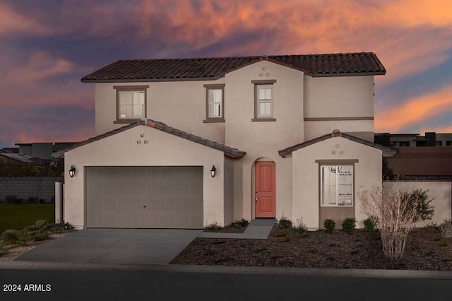 9243 E Sector Dr, Mesa, AZ 85212 - view of front facade with concrete driveway, a tiled roof, stucco siding, and fence