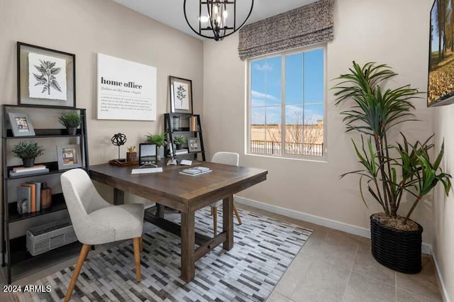 tiled home office with an inviting chandelier