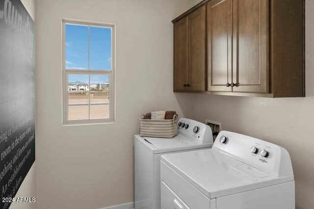 9243 E Sector Dr, Mesa, AZ 85212 - laundry area with cabinet space, baseboards, and washer and dryer