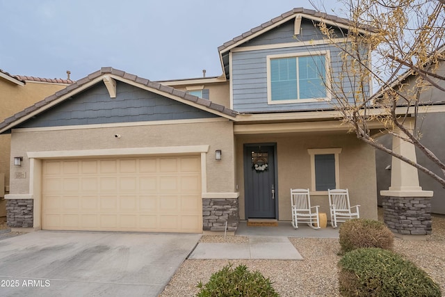 craftsman house featuring a garage and a porch