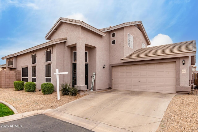 front of property with a garage