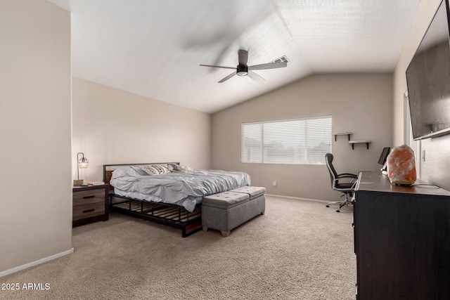 carpeted bedroom featuring lofted ceiling and ceiling fan