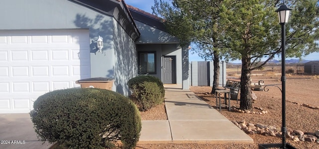 single story home featuring a garage