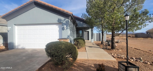 entrance to property with a garage