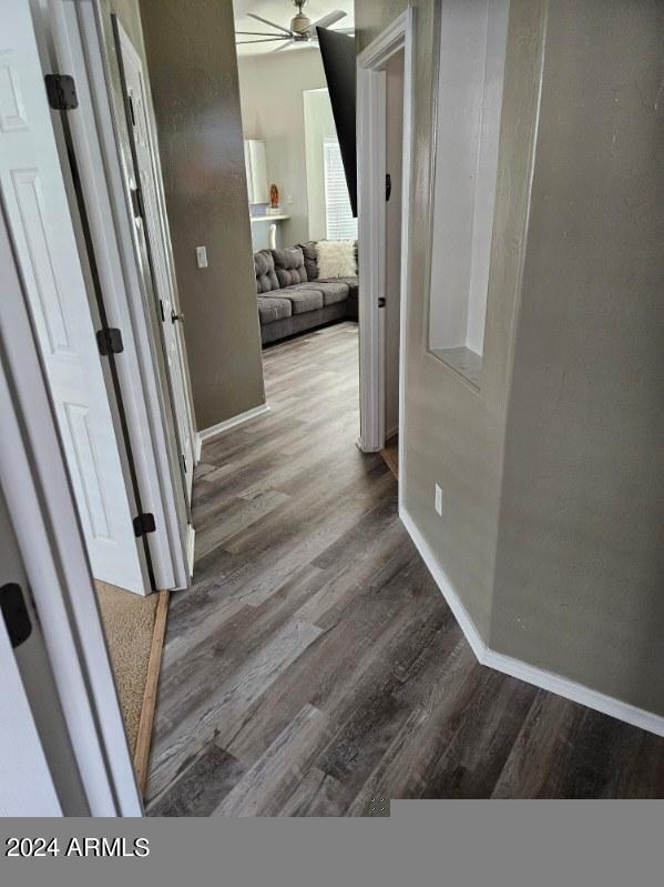 hallway featuring hardwood / wood-style flooring