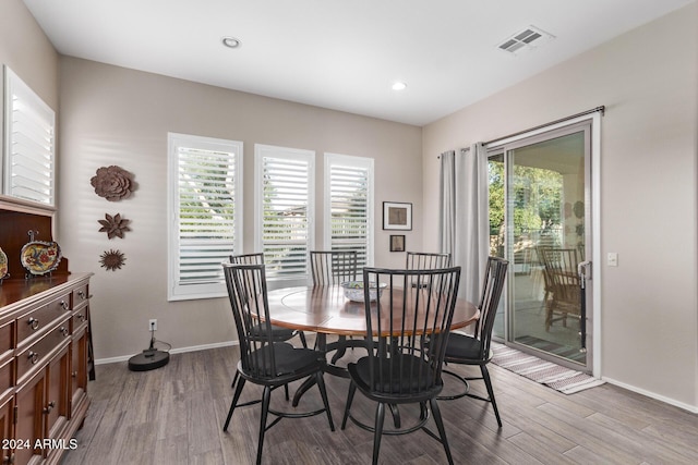 dining room featuring light hardwood / wood-style floors