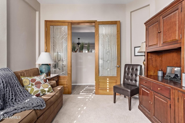 sitting room with light carpet