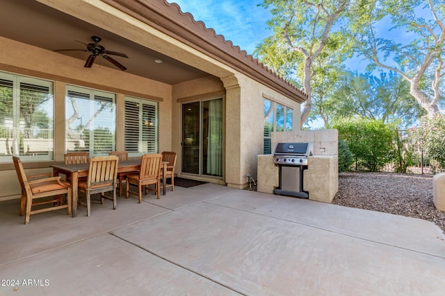 view of patio featuring grilling area and ceiling fan