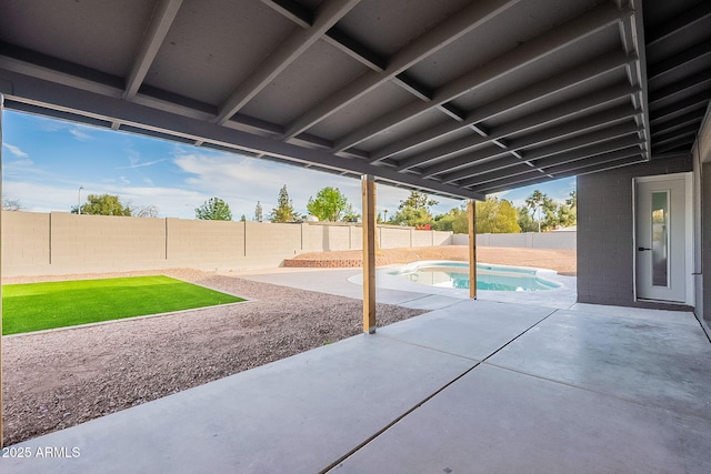 view of patio featuring a fenced in pool