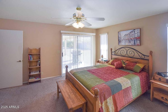 carpeted bedroom with ceiling fan and access to outside