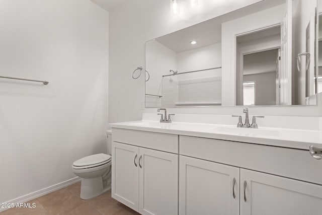 bathroom with walk in shower, tile patterned flooring, vanity, and toilet