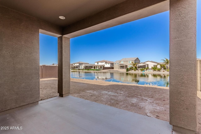 view of patio / terrace featuring a water view