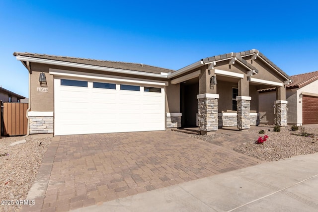 view of front of property featuring a garage