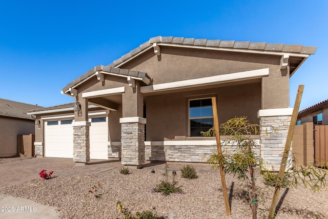 view of front of property featuring a garage