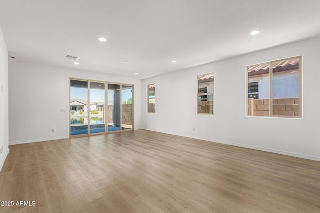 empty room with light wood-type flooring