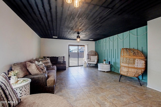 living room with tile patterned flooring and wooden ceiling